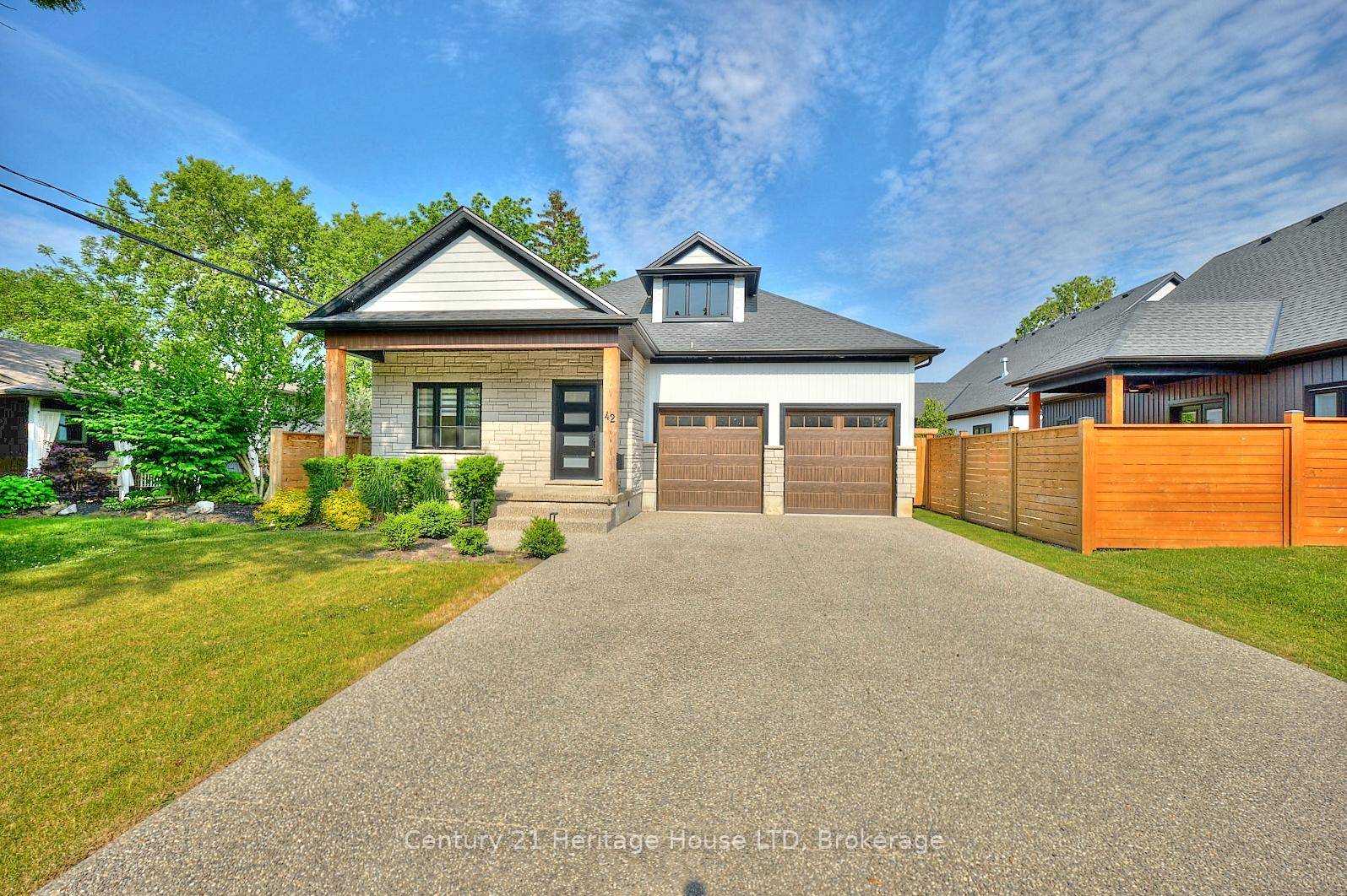 Exquisite custom built bungalow with over 3500 sq ft of finished living space, featuring in law capability with a 2nd kitchen and separate walk up from the lower level, all ...