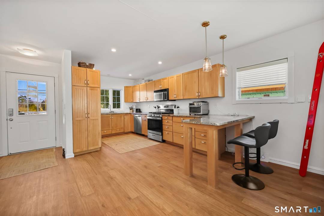 Spend your summer right on the shoreline in this beautifully furnished waterfront escape, where every day begins and ends with sweeping views of Long Island Sound.