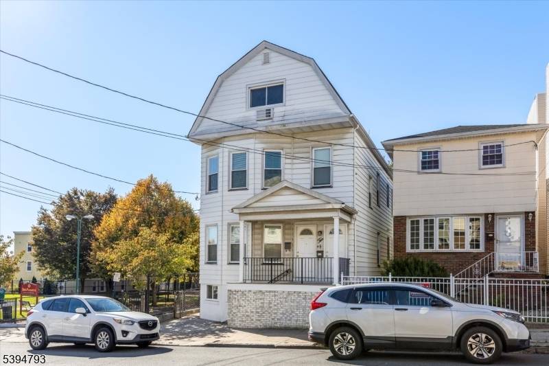 Newly Renovated 2 Family Home with Separate Entrances for Each Apartment.