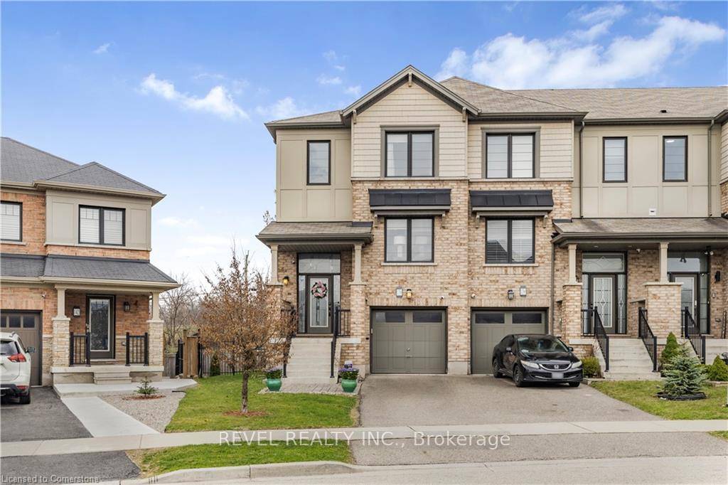 Welcome to this beautifully upgraded, corner unit freehold executive townhome in the coveted Heritage Green community.