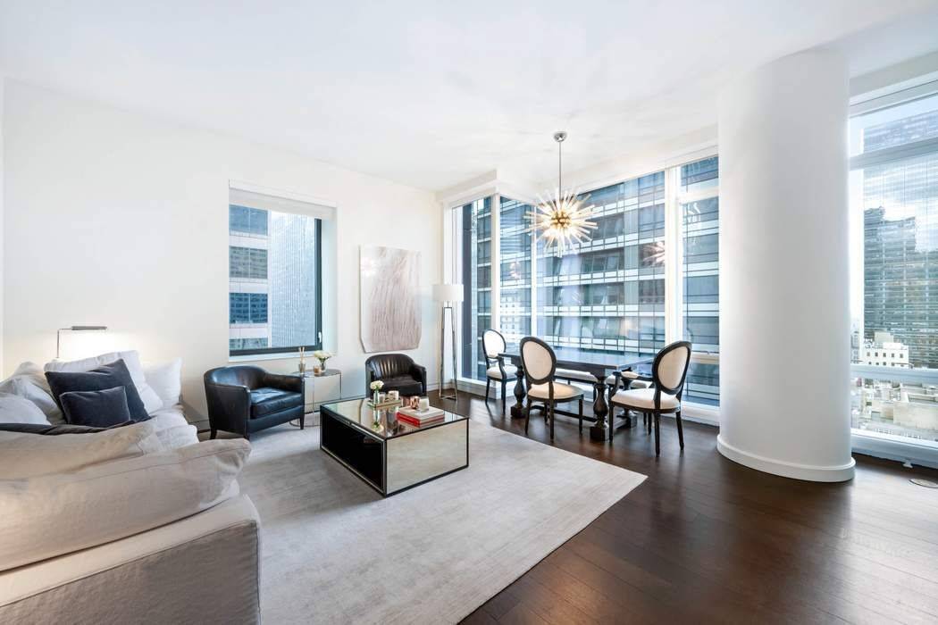 Exceptional design and refined elegance define this warm 20th floor, 1 bedroom, 1.