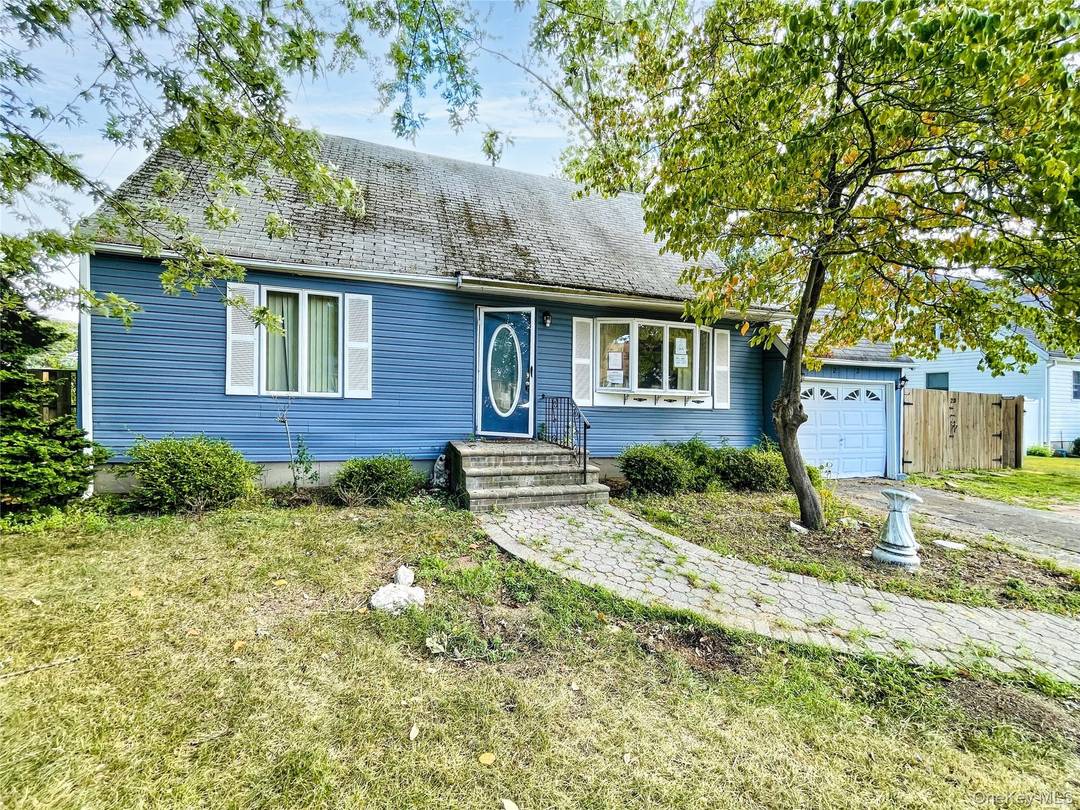 Discover the potential in this spacious 5 bedroom, 2 bathroom home located in the heart of Centereach.