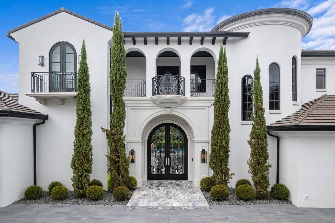 Situated on nearly half an acre with sweeping preserve and golf views, this is one of the most outstanding and refined homes to ever list in the prestigious Country Club ...
