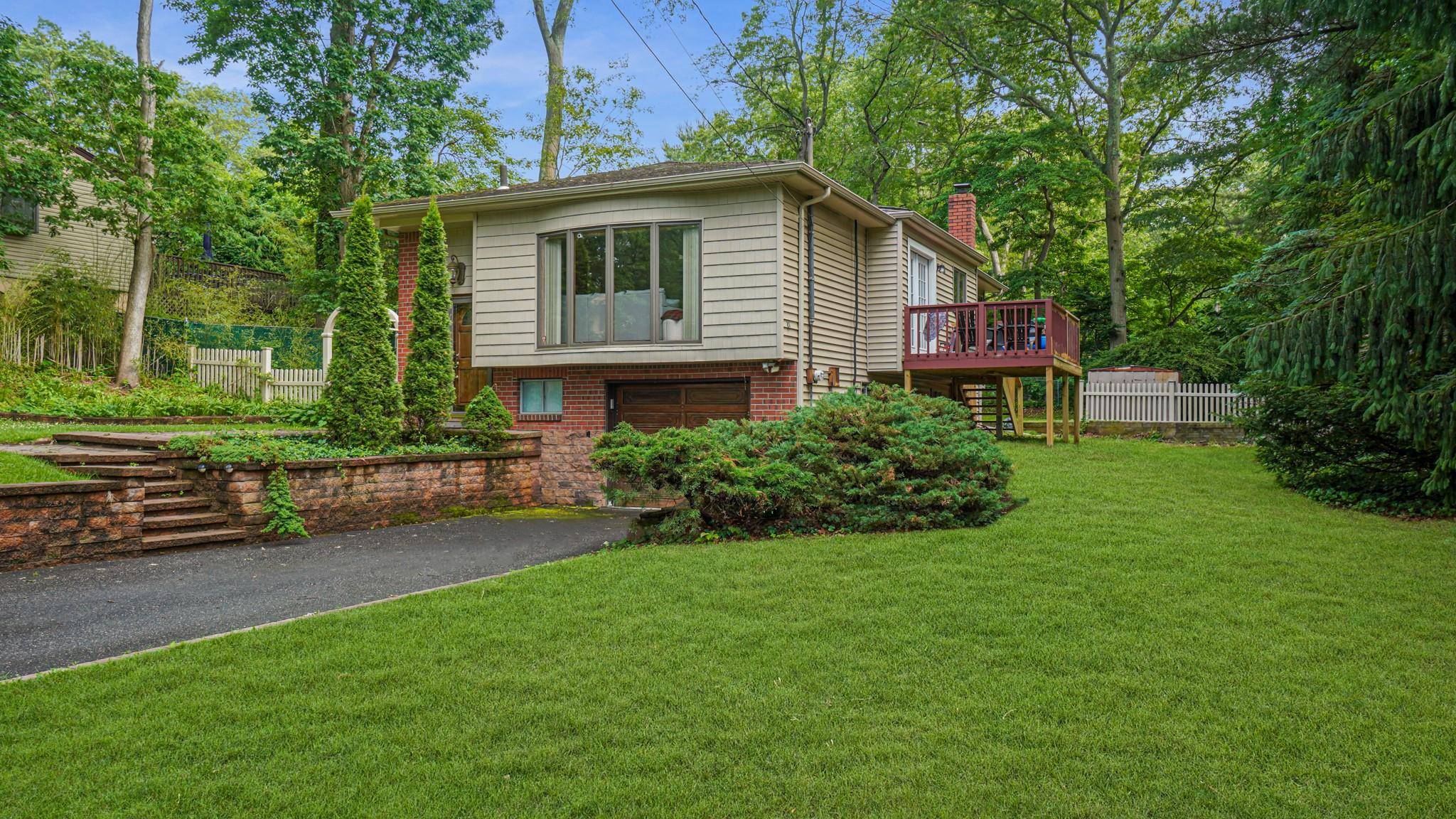 Immaculate 3 bedroom, 2 bath Hi Ranch in the desirable Smithtown School District featuring hardwood floors throughout and a beautifully updated kitchen with granite countertops, stainless steel appliances, and a ...