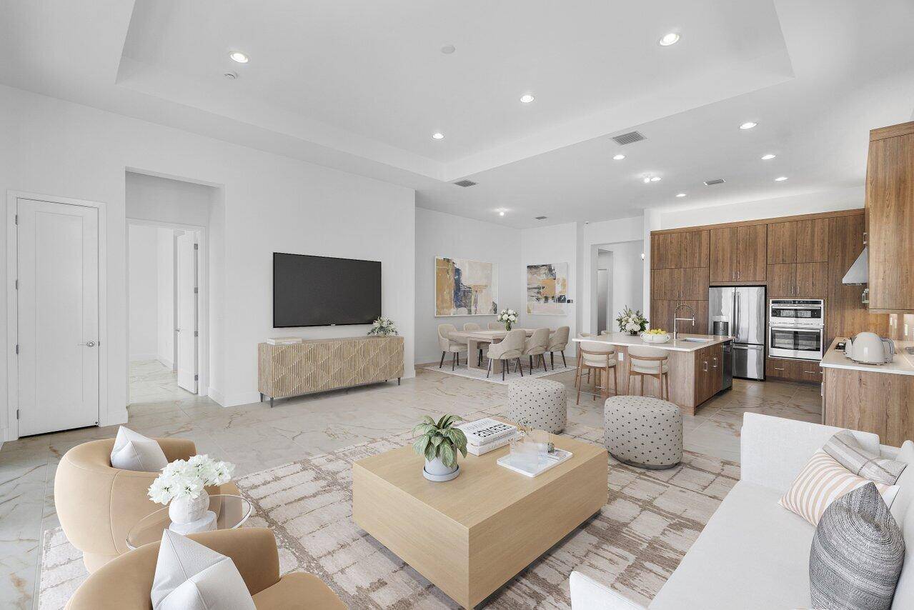 Step into modern luxury with this brand new, never lived in one story Bermuda model home in the prestigious Lotus Palm community of Boca Raton.
