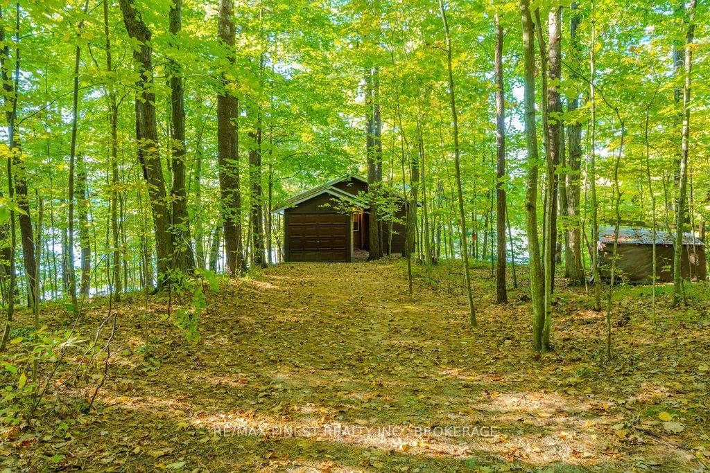 Incredible opportunity to own more than 35 acres on Opinicon Lake.