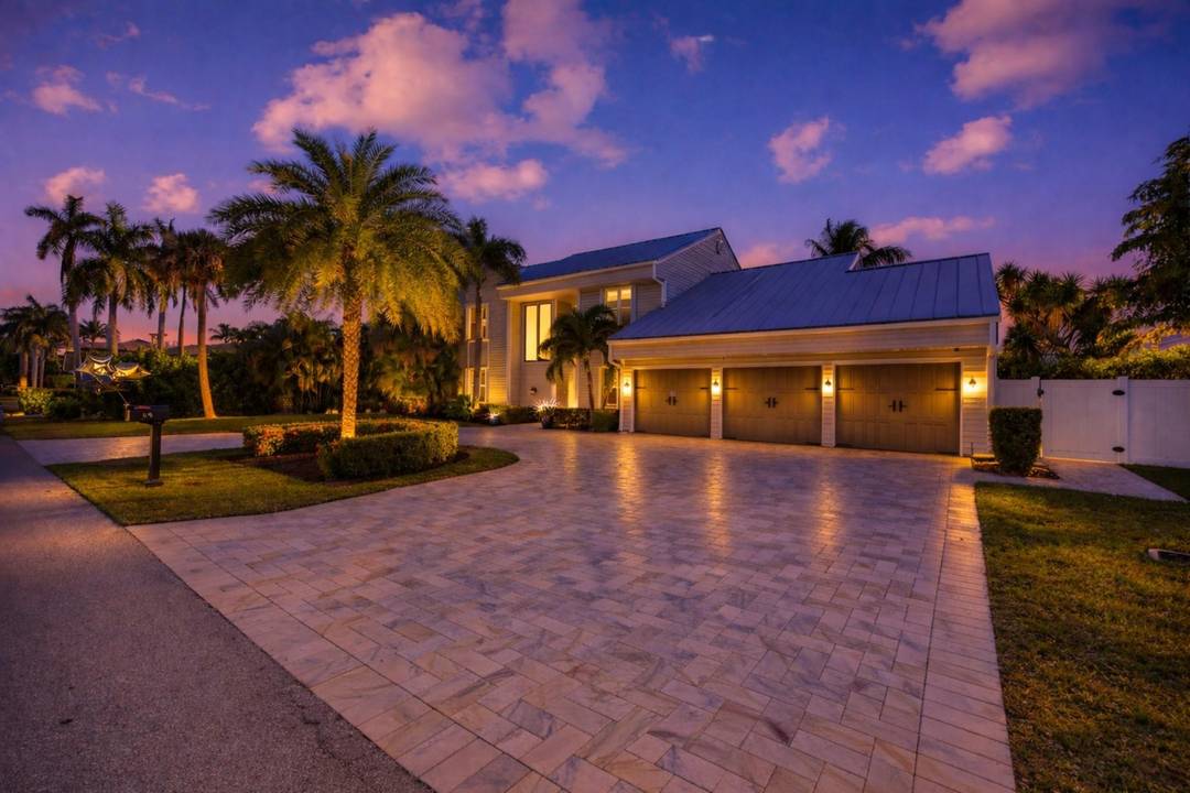 Stunning fully renovated waterfront estate in the prestigious Tropic Isles, one of Delray Beach s most sought after deep water communities surrounded by luxury new construction.