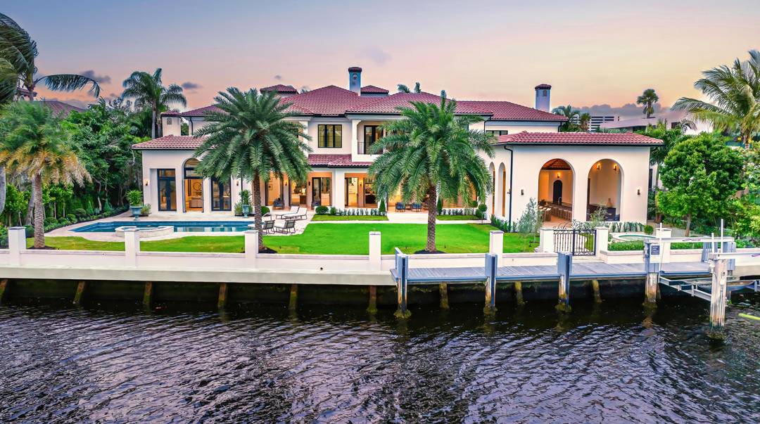 Ideally situated on an oversized Intracoastal lot with 135' of waterfrontage, just blocks from the beach in Boca Raton's prestigious Estates Section, this newly remastered Intracoastal estate marries California chic ...