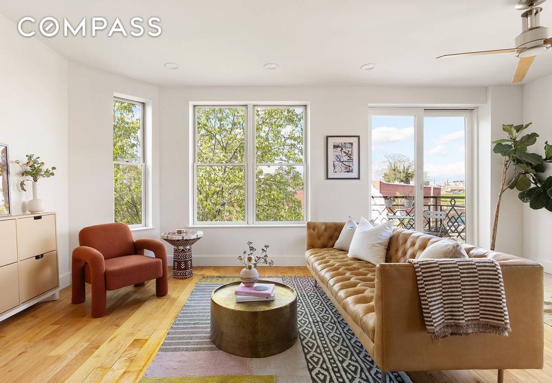 Super Bright Duplex Condo with Massive Private Roof Deck Welcome to this sun filled 3 Bedroom plus home office 2.