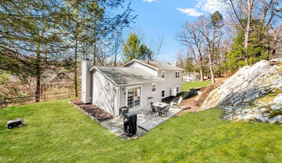 Welcome to South Salem ! This beautiful split level home sits nicely on a hill and has a huge private lot.