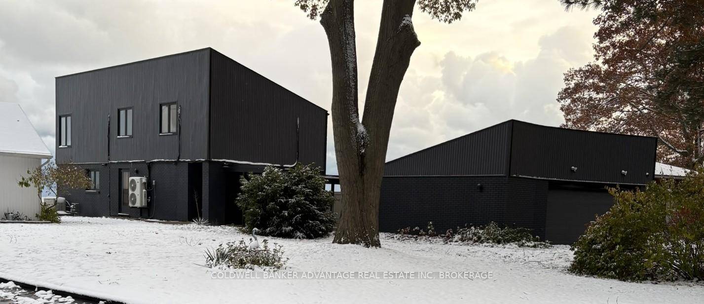 Enjoy sweeping views of Port Colborne's lighthouse and Sugarloaf Marina from this lakefront home.