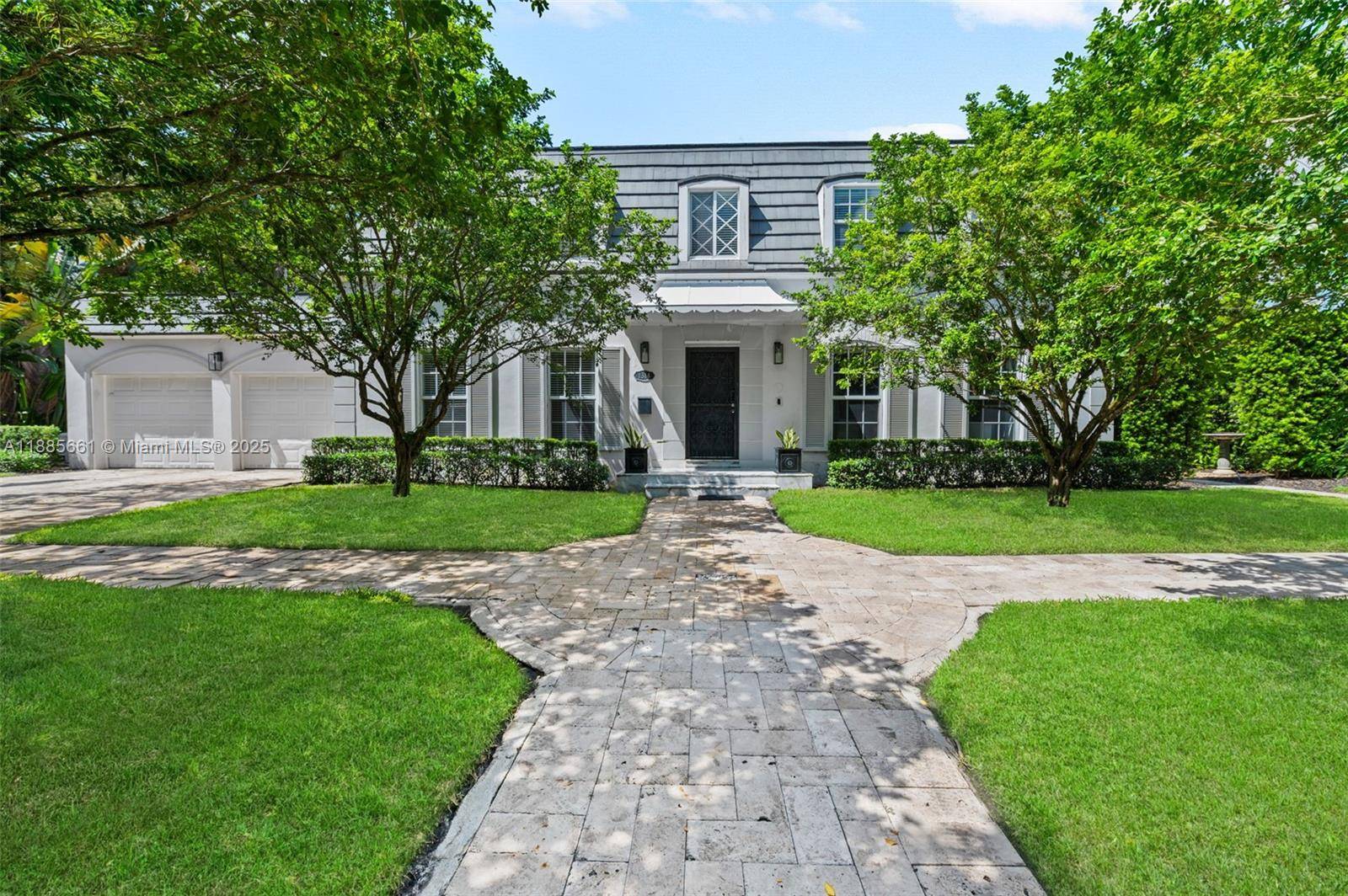Nestled on an oversized lot along historic Country Club Prado, this French Country style two story home blends classic elegance with modern luxury.