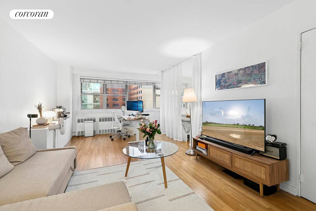 Welcome to Residence 14A at 111 Third Avenue a bright and thoughtfully designed alcove studio in one of the East Village's most convenient full service buildings.