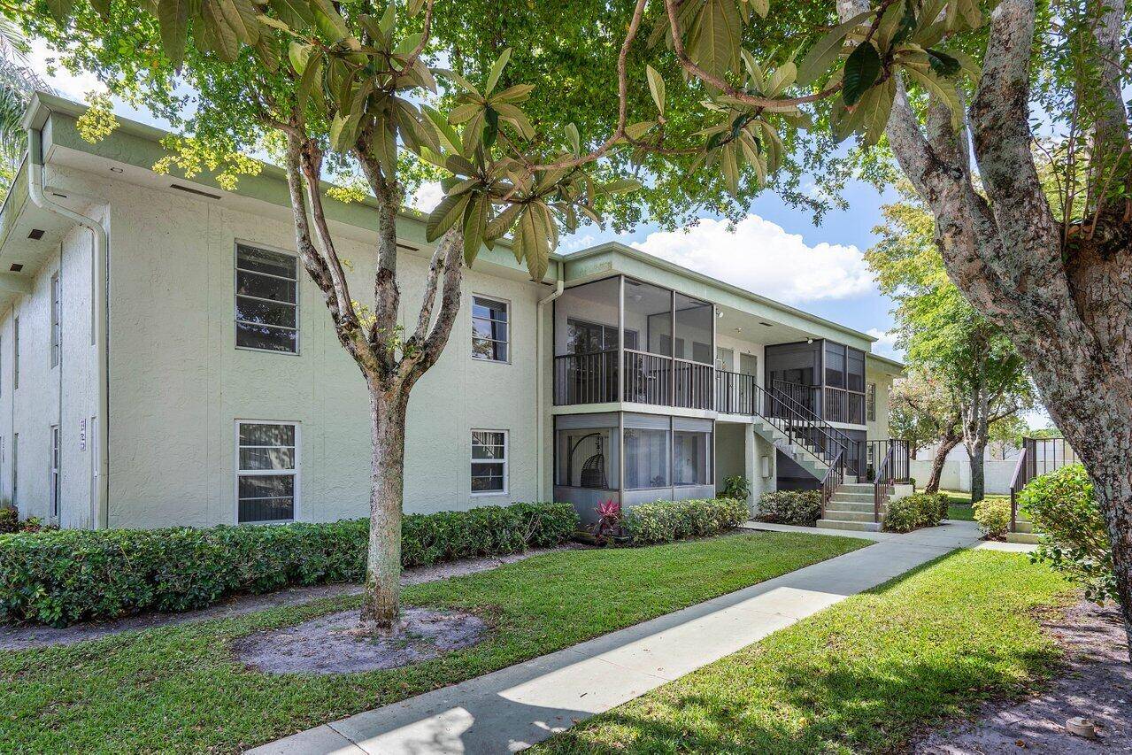 Explore the allure of spacious and cozy living within this welcoming condo situated in the tranquil active 55 community of Evergreen in Delray Beach.
