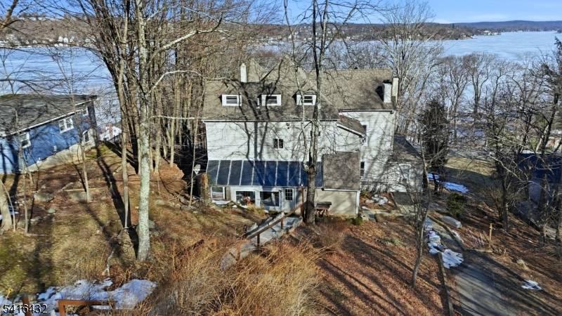 Charming, income producing multi family just steps from Lake Hopatcong a rare value add opportunity in a highly desirable lake community offering stunning views.