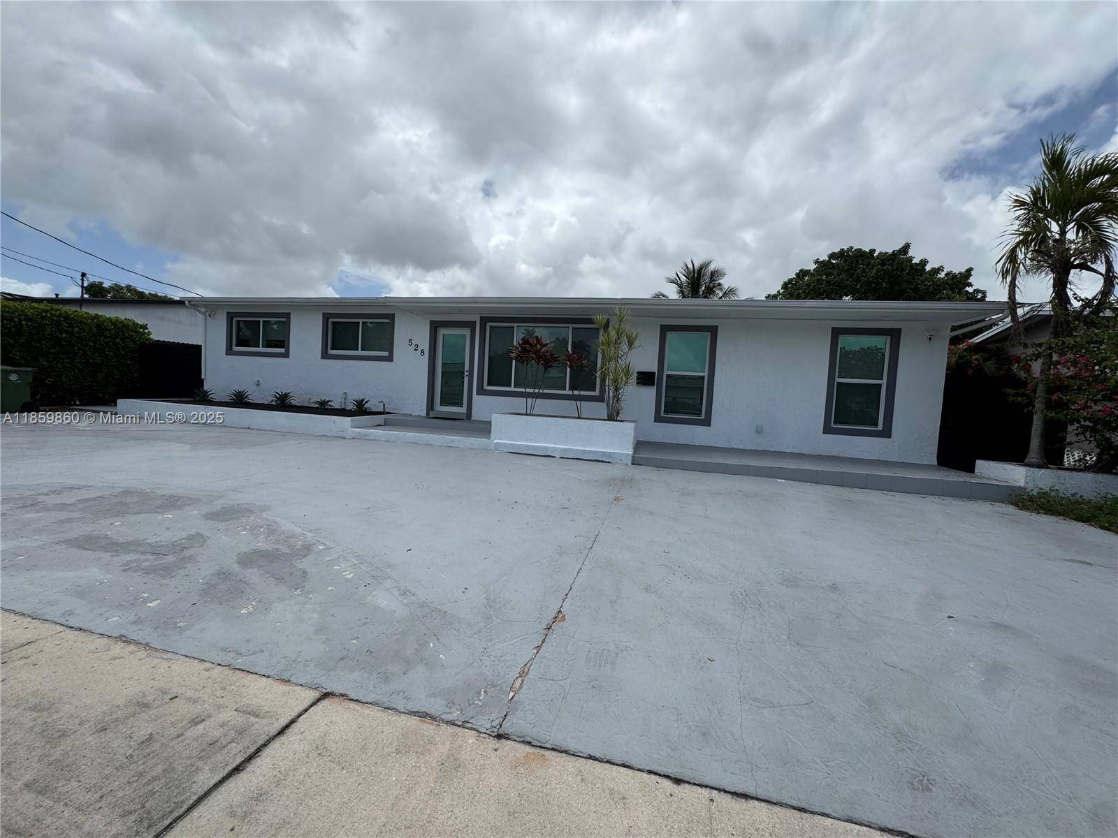 Spacious 8 bedroom, 4 bath home featuring a 2019 roof, new impact windows, new A C, and new water heater for peace of mind.