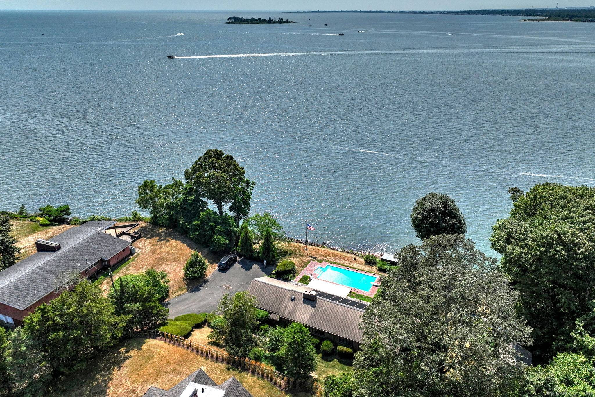 DIRECT WATERFRONT 183 FEET OF LONG ISLAND SOUND FRONTAGE Experience rare privacy and panoramic views from this exceptional Point Lookout residence in Milford.