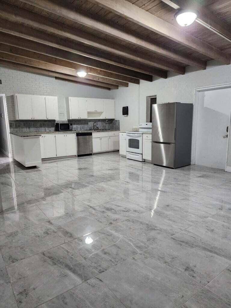 Beautifully remodeled centrally located 4 2 Pool home on a huge corner lot !