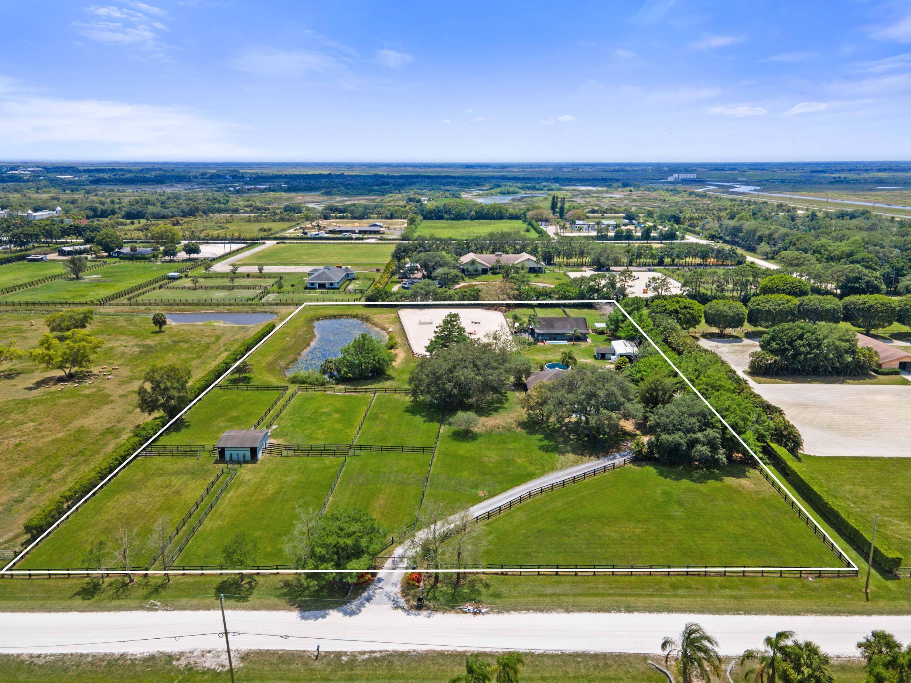 This 5 acre property in Rustic Ranches features a 4 bedroom, 2 bath home, equestrian facilities with 8 stalls, 6 paddocks, a1bed 1bath furnished grooms quarters, and a195x105 sand ring.