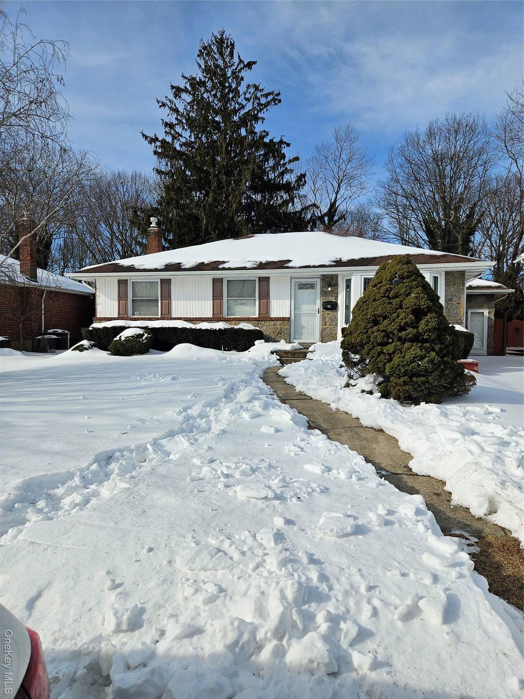 Amazing expanded ranch on lovely street in the birchwood park section of Syosset.