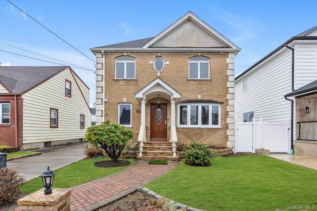 Beautifully maintained 5 bedroom, 2 bathroom colonial in the heart of Mineola.