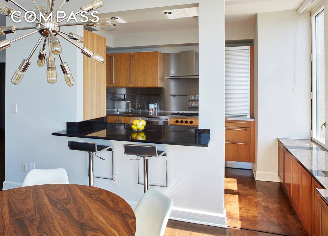 Spacious sun filled tranquil combination 4 bedroom, 3 bathroom plus home office condominium with sweeping unobstructed Hudson River views located on West 70th Street.