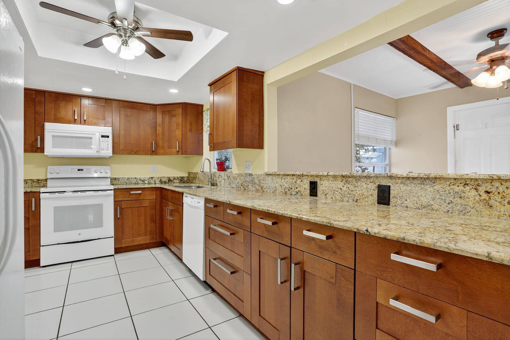 Welcome to 161 NW 24th Ct in Leisureville, one of Pompano Beach's most desirable 55 active adult communities.