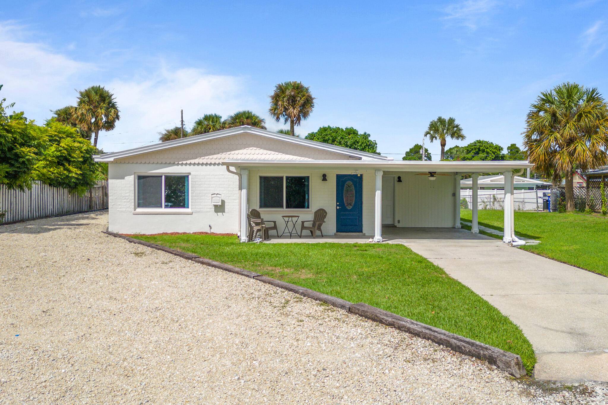 Perched ''high on the hill'' in one of Florida's highest elevation areas, this charming 3 bed, 2 bath concrete block home in Jensen Beach requires no flood insurance !
