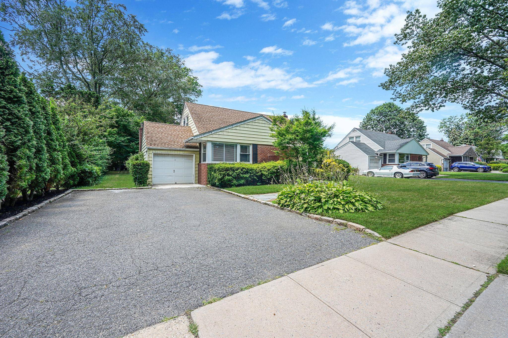 Bring your vision to life in this charming 4 bedroom, 2 full bath Cape Cod, Conveniently Located in the Heart of Westbury !