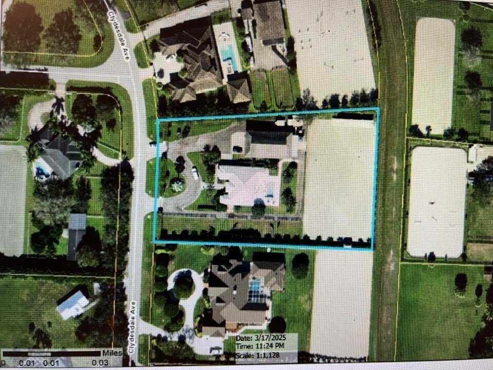 Fantastic turn key farm recently remodeled with impact glass and doors, a new AC 2025, newer center aisle Barn with 7 stalls, grooms apt, bath and laundry, tack room, 210 ...