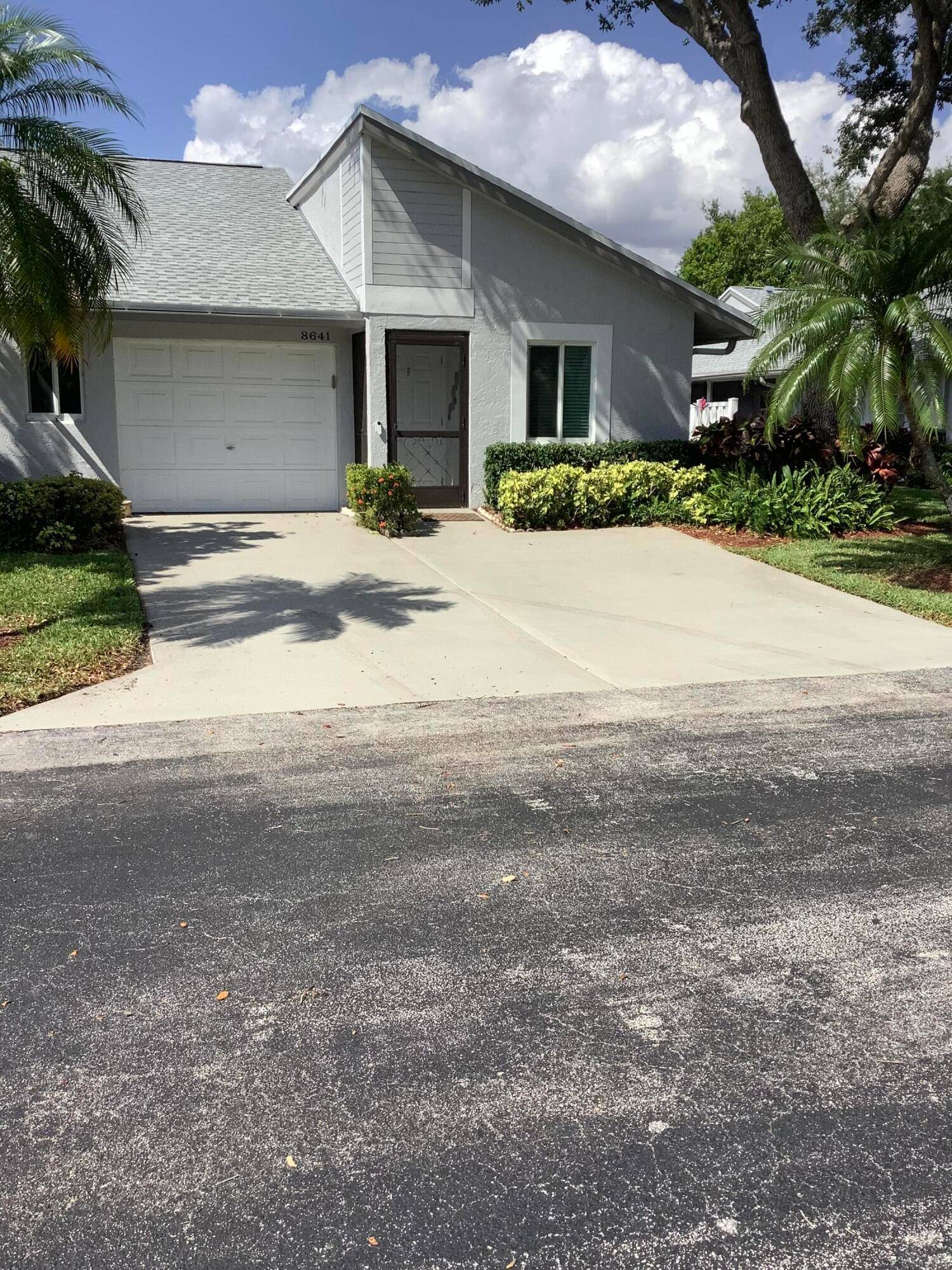This home has a BRAND NEW ROOF, NEW AIR CONDITIONER AND HURRICANE WINDOWS !