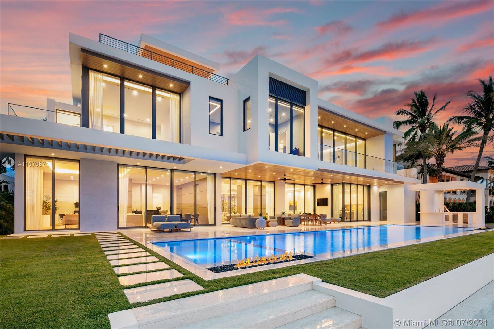This stunning modern masterpiece boasts 6 beds, 7 full baths 2 half baths in the highly sought after Harbor Beach gated community.