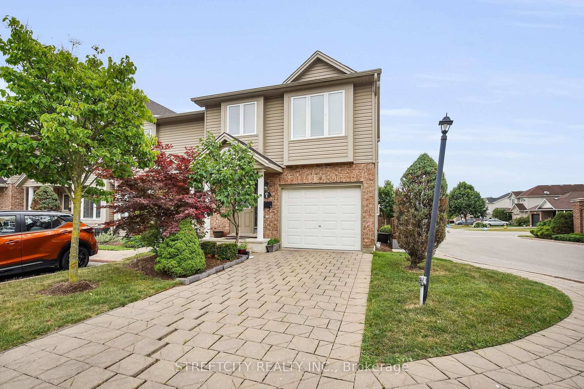 Welcome to Unit 1 at 1320 Savannah Drive, a charming and well maintained 3 bedroom 5 level townhouse in desirable North London, proudly offered by the original owner.