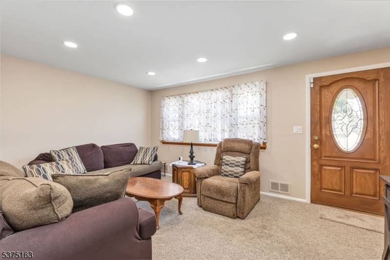 Bring your vision and creativity to this 3 bedroom 2 bath Cape Cod home.