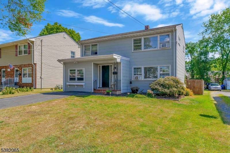 Spacious Colonial featuring 4 bedrooms and 2 full baths.