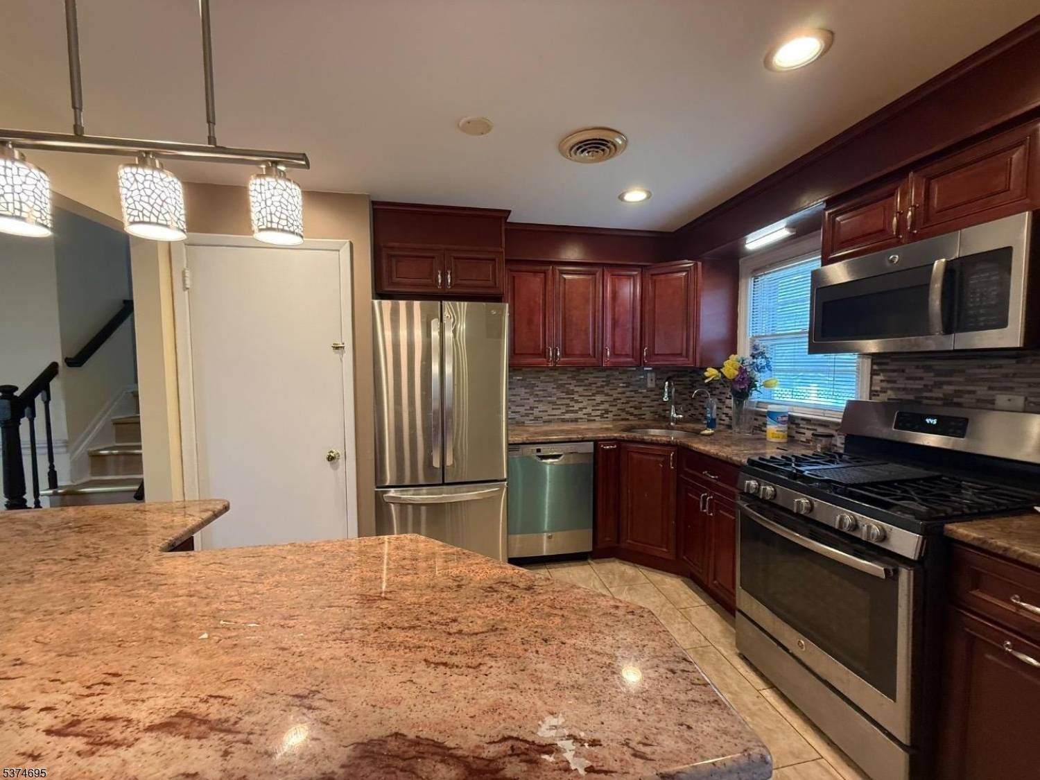 Welcome Home to this Beautifully Renovated Split Level House on the desirable Sunnyside Section of Linden.