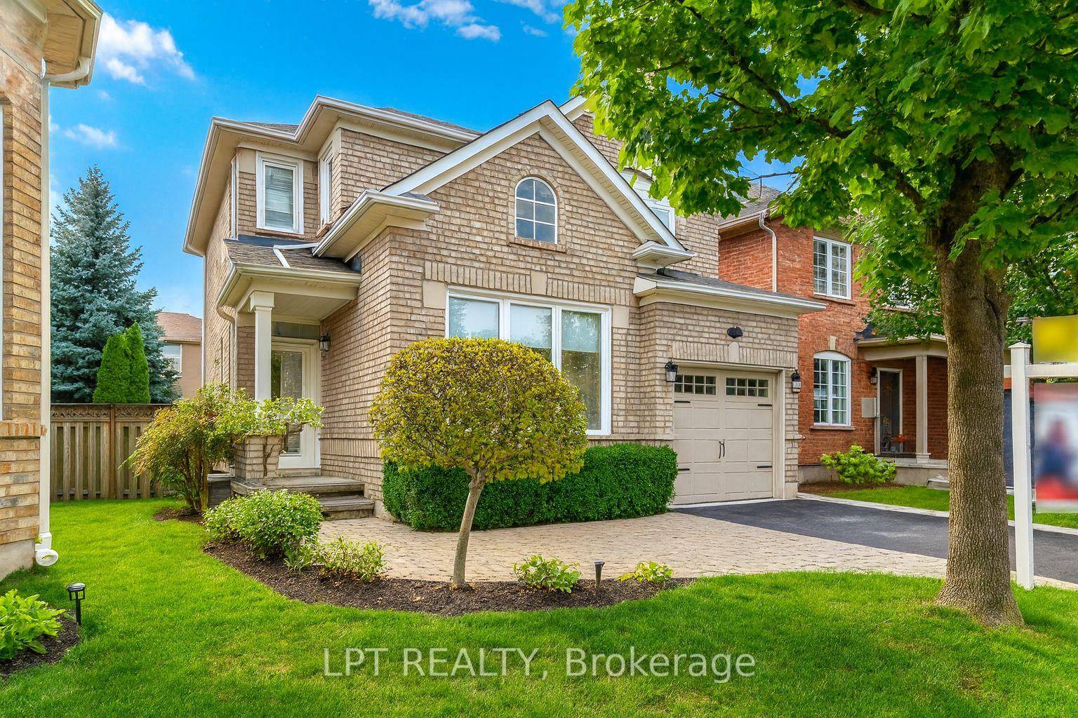 An elegant entrance leads into a bright, sun filled living room that opens seamlessly to the dining area and gourmet kitchen, with a striking staircase as the perfect focal point.