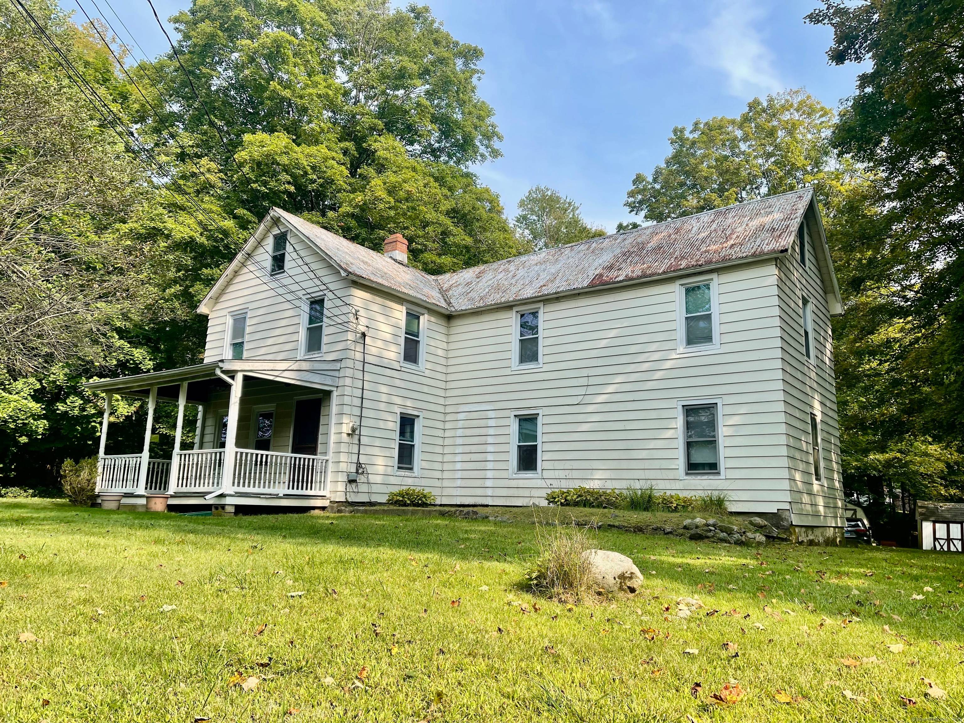 IDEAL FOR AN INVESTOR, HOME IS ZONED AS A 2 FAMILY.