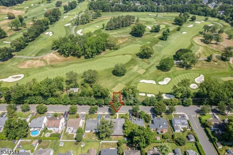 Beautifully maintained and thoughtfully updated, this expansive, all brick ranch offers approx.