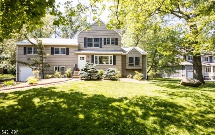 Located on a quiet cul de sac in the highly desirable Broadlawn section of Livingston, this expanded split level home offers the perfect blend of space, comfort, and convenience.