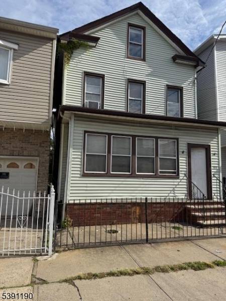 Great income maker 2 unit colonial style property with a finished attic and a basement.