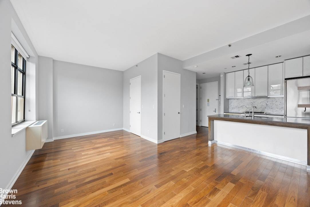Welcome to this rarely available loft like studio and convertible one bedroom home.