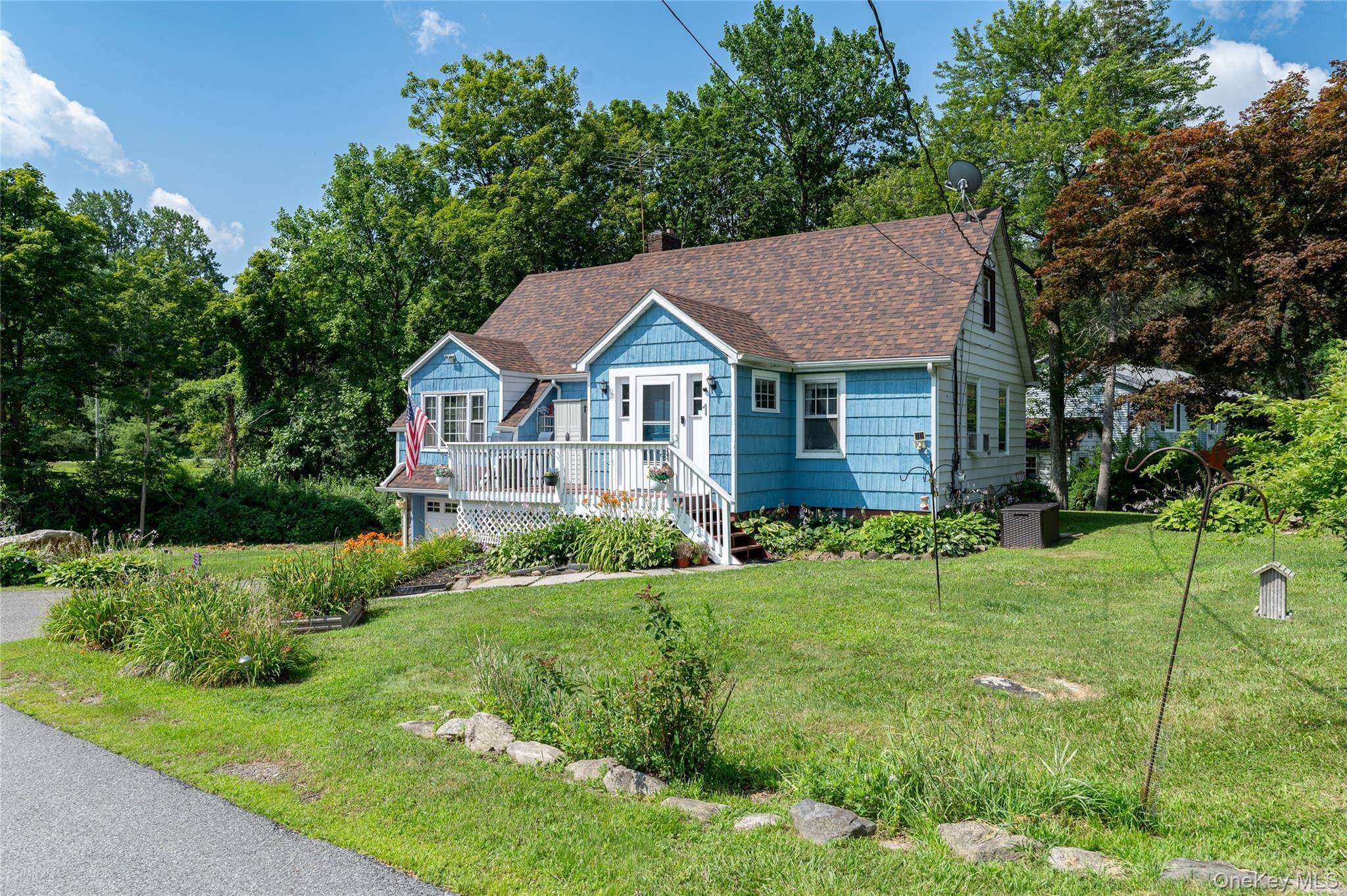 Tucked away on a peaceful cul de sac with lake views and private lake access, this 3 bedroom Cape offers classic charm, thoughtful updates, and an unbeatable Mahopac location.