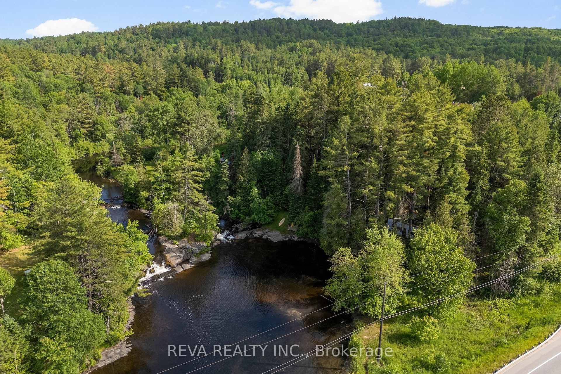 Water Oasis ! This charming old building and lot with towering white pines is waiting for its next lover of the outdoors, who can clean up the inside and refinish ...