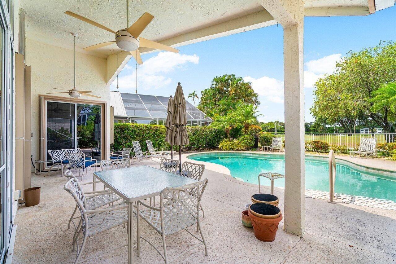 Immaculate Golf Course Pool Home in Eastpointe Country ClubTucked away in the lush surroundings of Eastpointe Country Club, this beautifully renovated 2 bedroom, 2 bath plus den Florida Room home ...