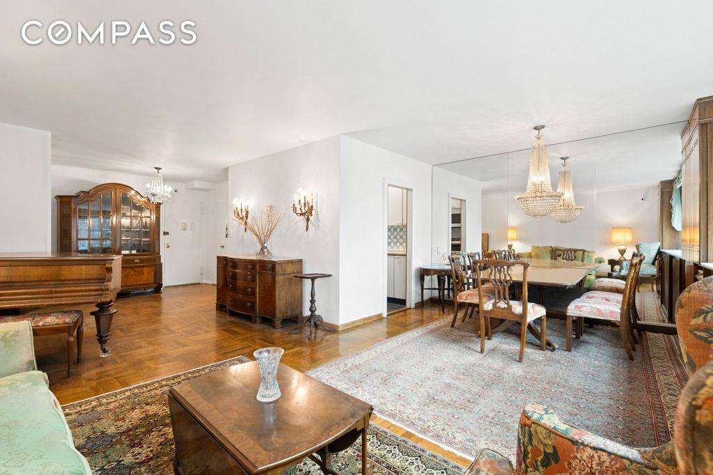 Welcome to this expansive two bedroom, two bath residence at The Coliseum, located at 30 West 60th Street.