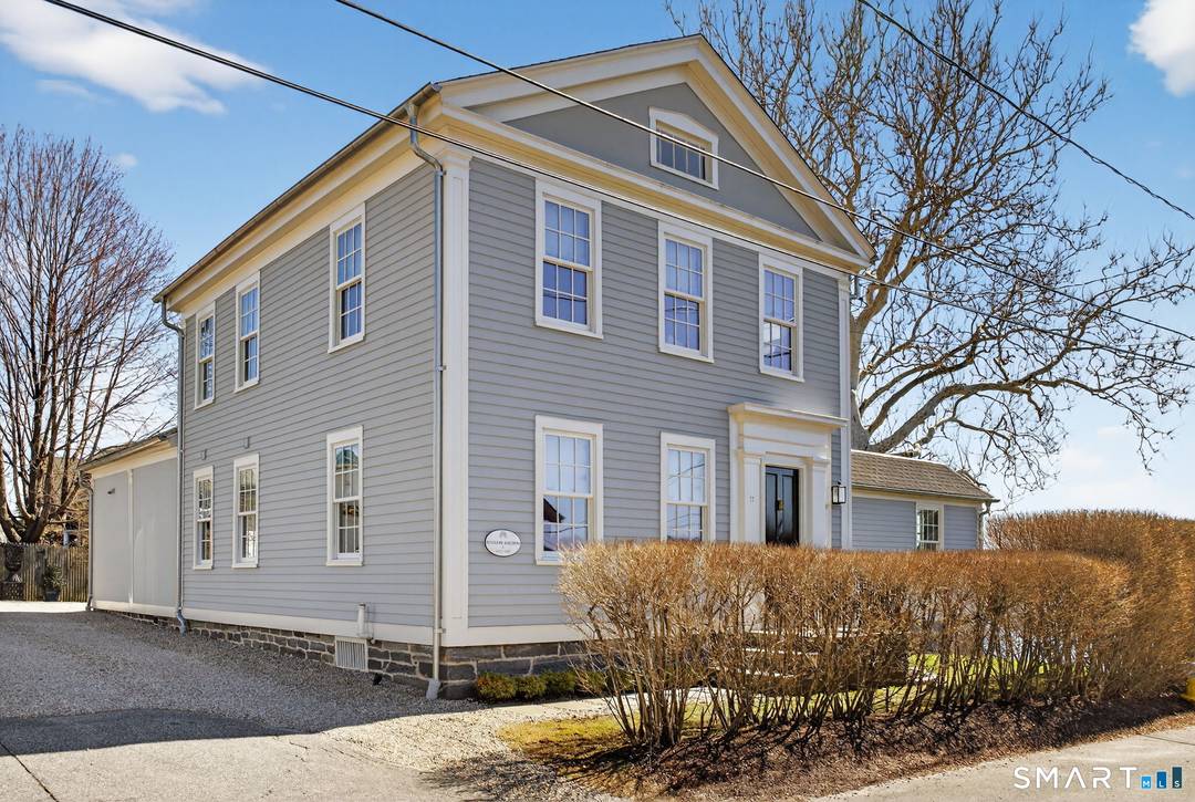 Experience the essence of Essex village living in this distinguished historic home.