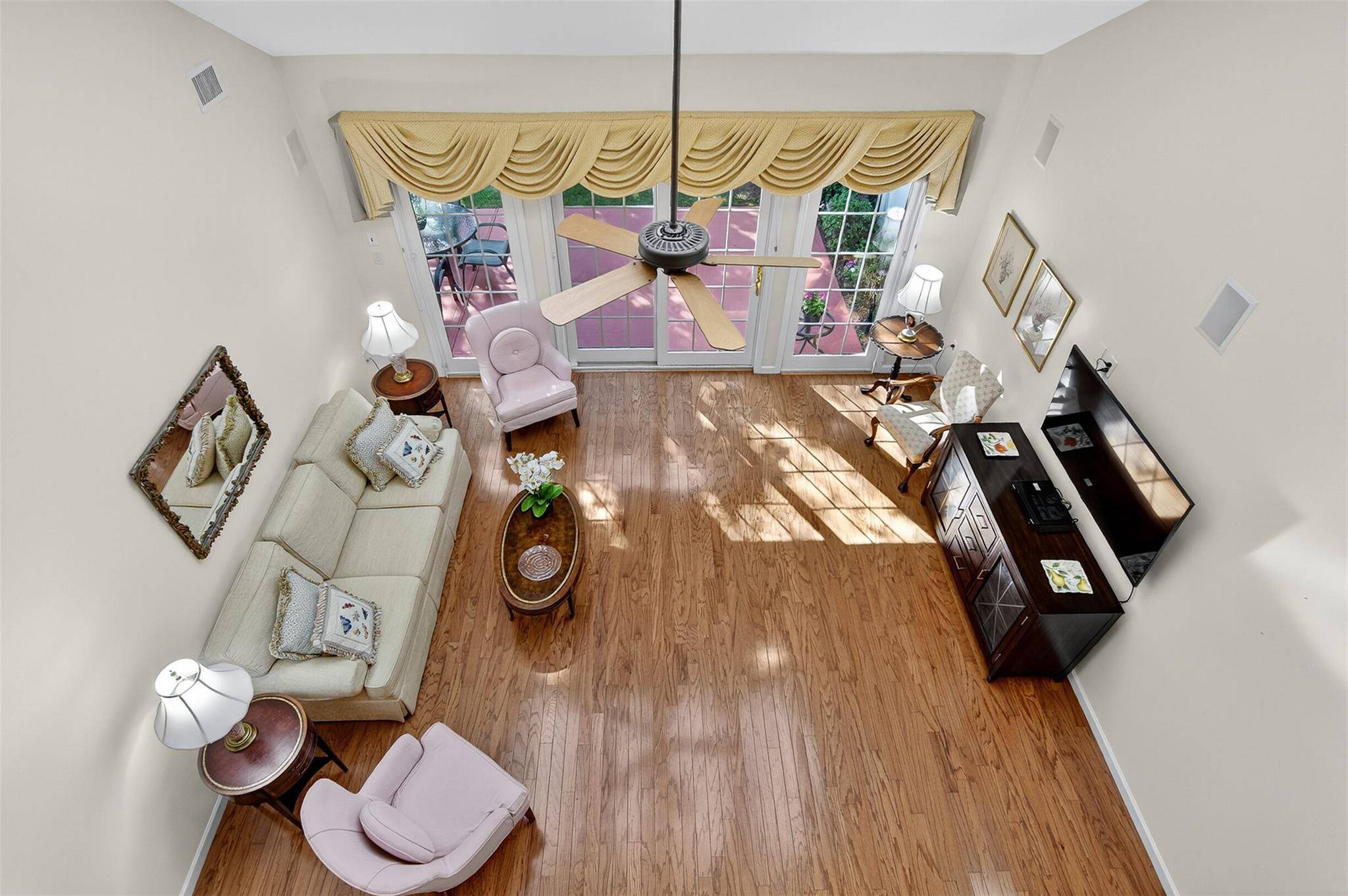 Nestled within the desirable 55 gated community of Mill Pond Acres, this elegant end unit New Englander Model home offers comfort, convenience, and a serene setting.