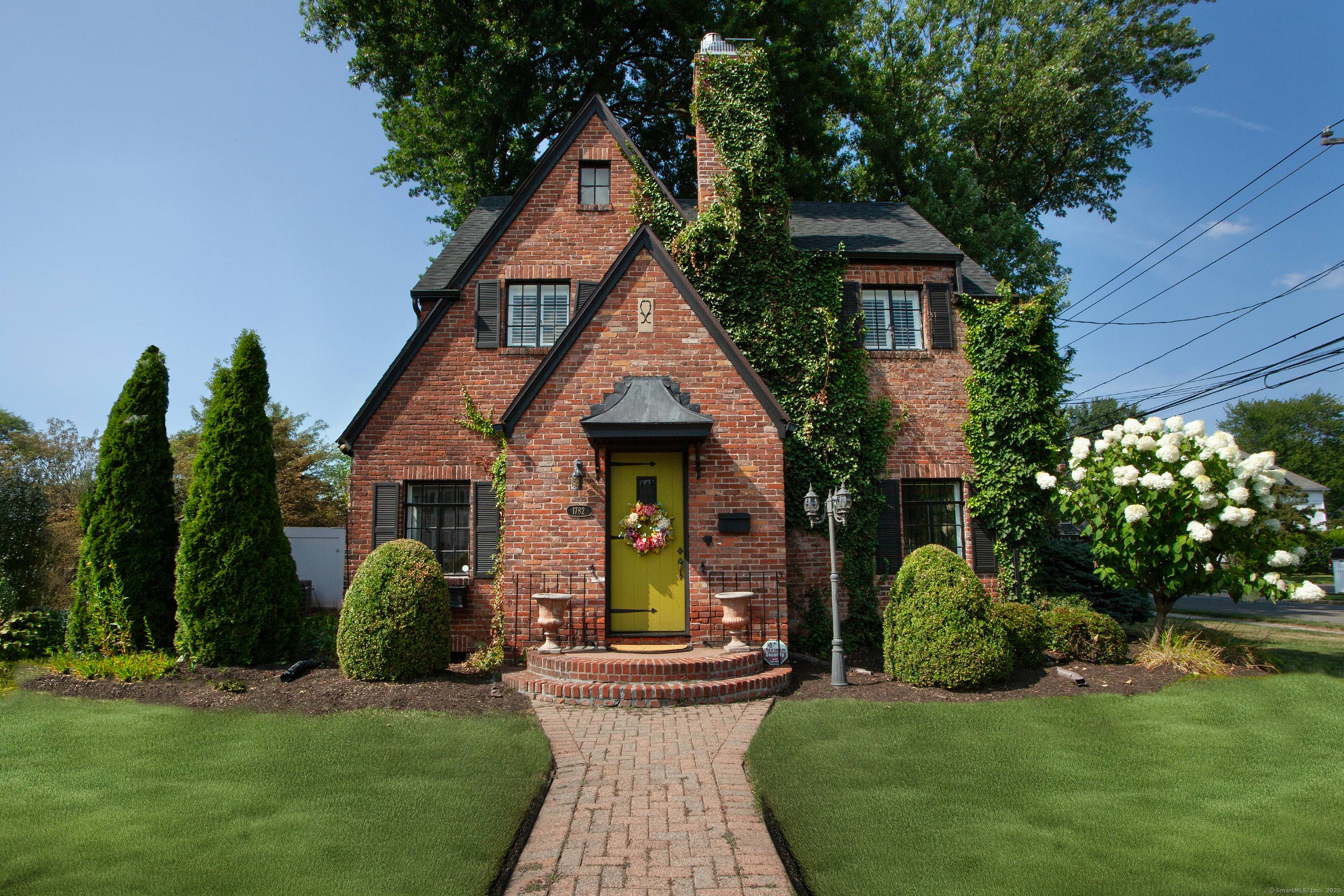 This stunning brick tudor is a jewel in the heart of West Hartford center !