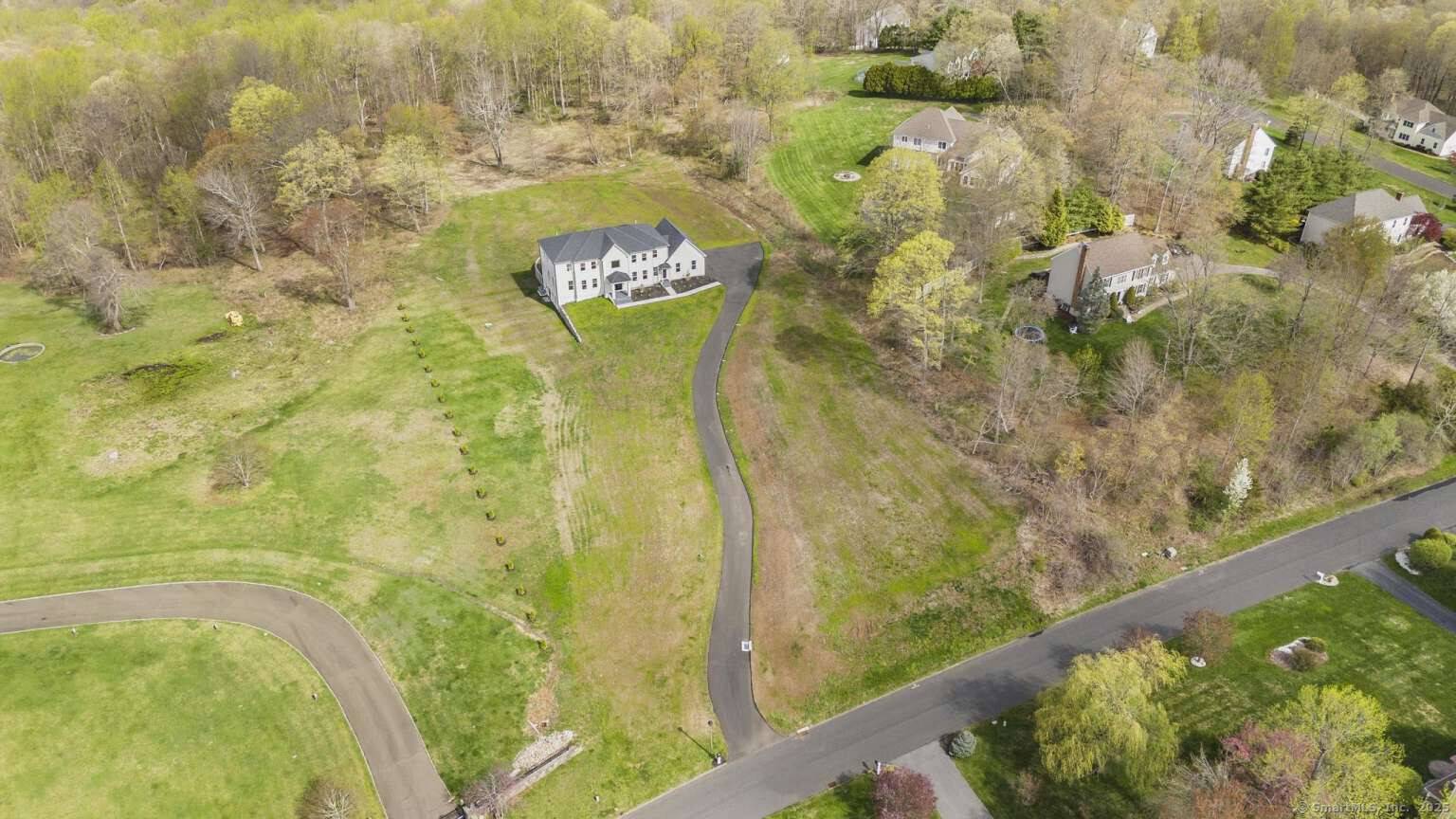 Welcome to 42 Pine ledge trail exceptional new construction This stunning colonial home, featuring stucco exteriors, offers four bedrooms and three full bathrooms, along with two half baths, all set ...